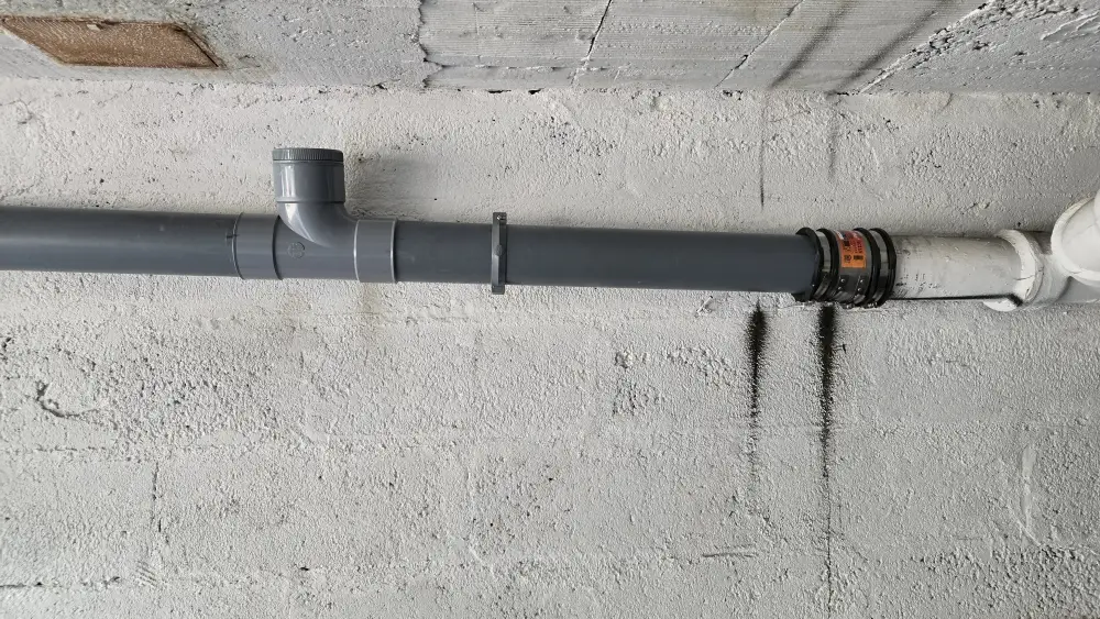 réparation sur colonne fonte évacuation immeuble (1)